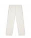 Белые спортивные брюки с серебристыми заклепками MM6 Maison Margiela | Фото 1