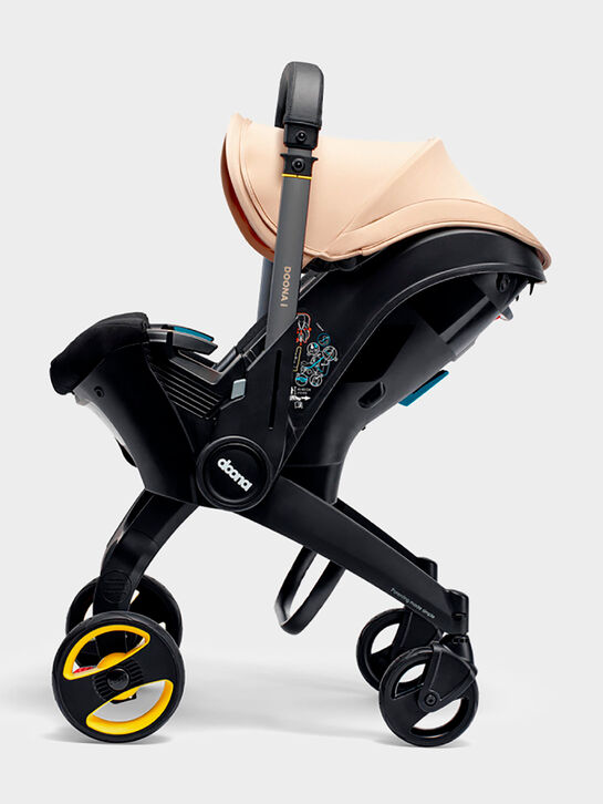 Коляска-автокресло Dоona i Sahara Sand в комплекте с базой ISOFIX Doona | Фото 4
