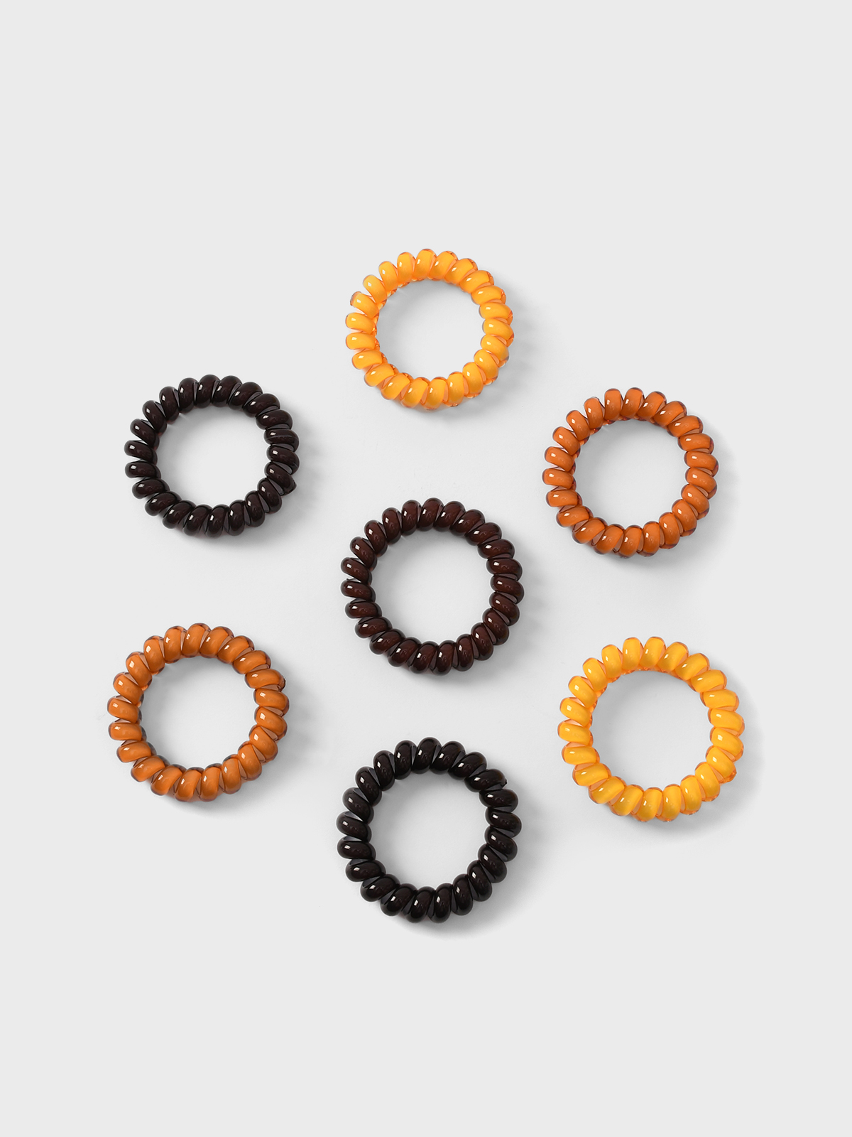 Набор резинок пружинок для волос коричневый 7 шт Tais 1499₽