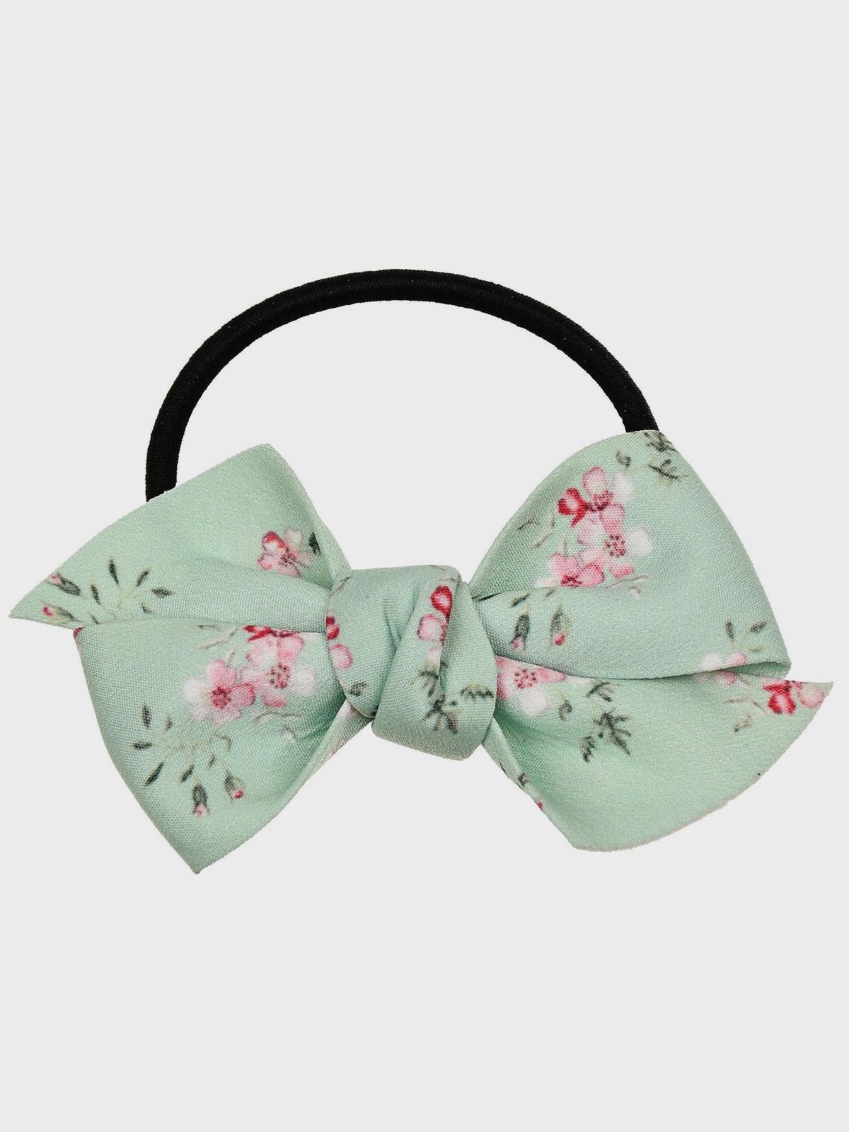 Резинка для волос с бантиком в цветочек зеленая Tais 1199₽