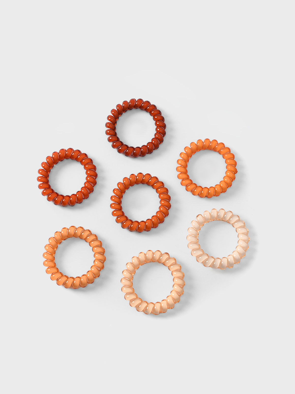Набор резинок пружинок для волос оранжевый 7 шт Tais 1499₽