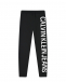 Черные спортивные брюки с белым логотипом Calvin Klein | Фото 1