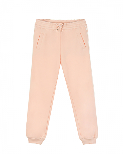 Розовые спортивные брюки с карманами  | Фото 1
