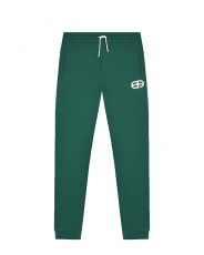 Зеленые спортивные брюки с белым лого