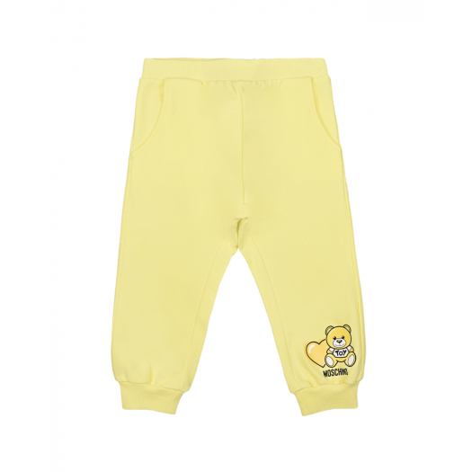 Желтые спортивные брюки Moschino | Фото 1