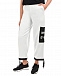 Белые спортивные брюки с черными карманами 5 Preview | Фото 7