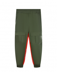 Зеленые спортивные брюки с накладными карманами