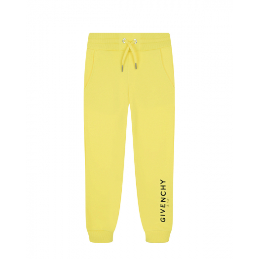 Желтые спортивные брюки с черным лого  | Фото 1