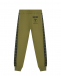 Спортивные брюки цвета хаки Moschino | Фото 1