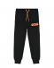 Черные спортивные брюки с оранжевым логотипом GCDS | Фото 1