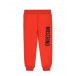 Красные спортивные брюки с принтом &quot;медвежонок&quot; Moschino | Фото 1
