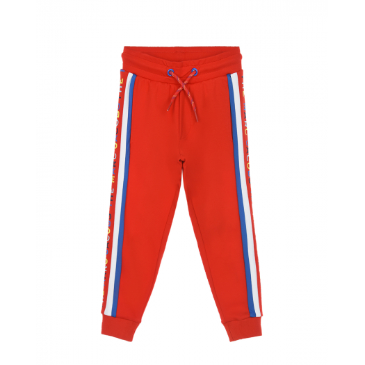 Красные спортивные брюки с разноцветными лампасами  | Фото 1